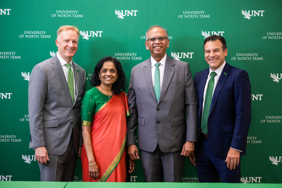 From left: UNT President Harrison Keller, Ph.D., Anuradha Sinha, Vikas Sinha and Brandon Buzbee