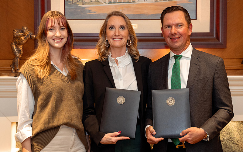 Dr. Colin and Jessica Meyer, along with their daughter, Alexis (left), attend the signing event for their transformative $1 million gift to the UNT TAMS program.