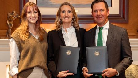 Dr. Colin and Jessica Meyer, along with their daughter, Alexis (left), attend the signing event for their transformative $1 million gift to the UNT TAMS program.